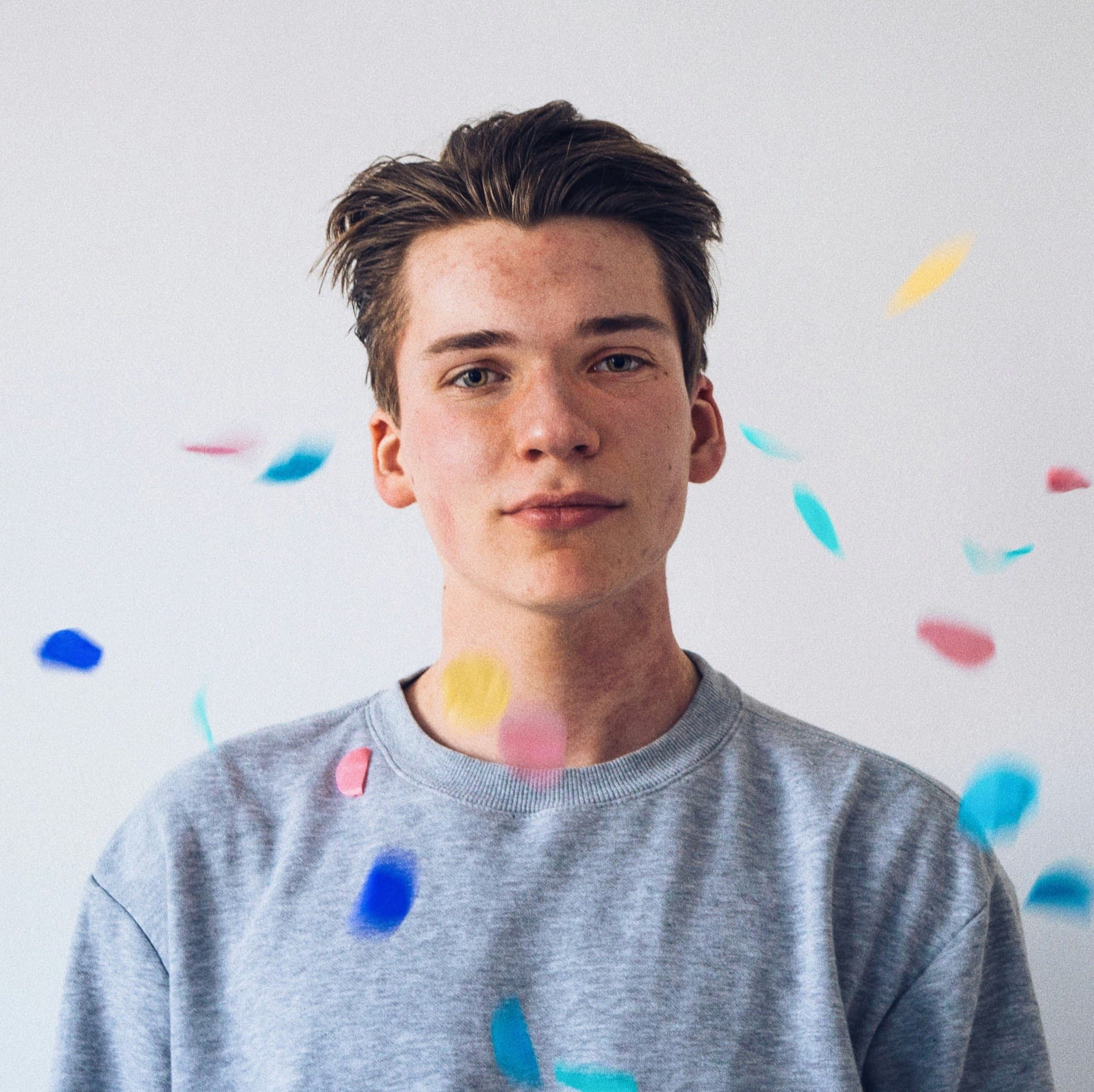 A teen looking directly at the camera