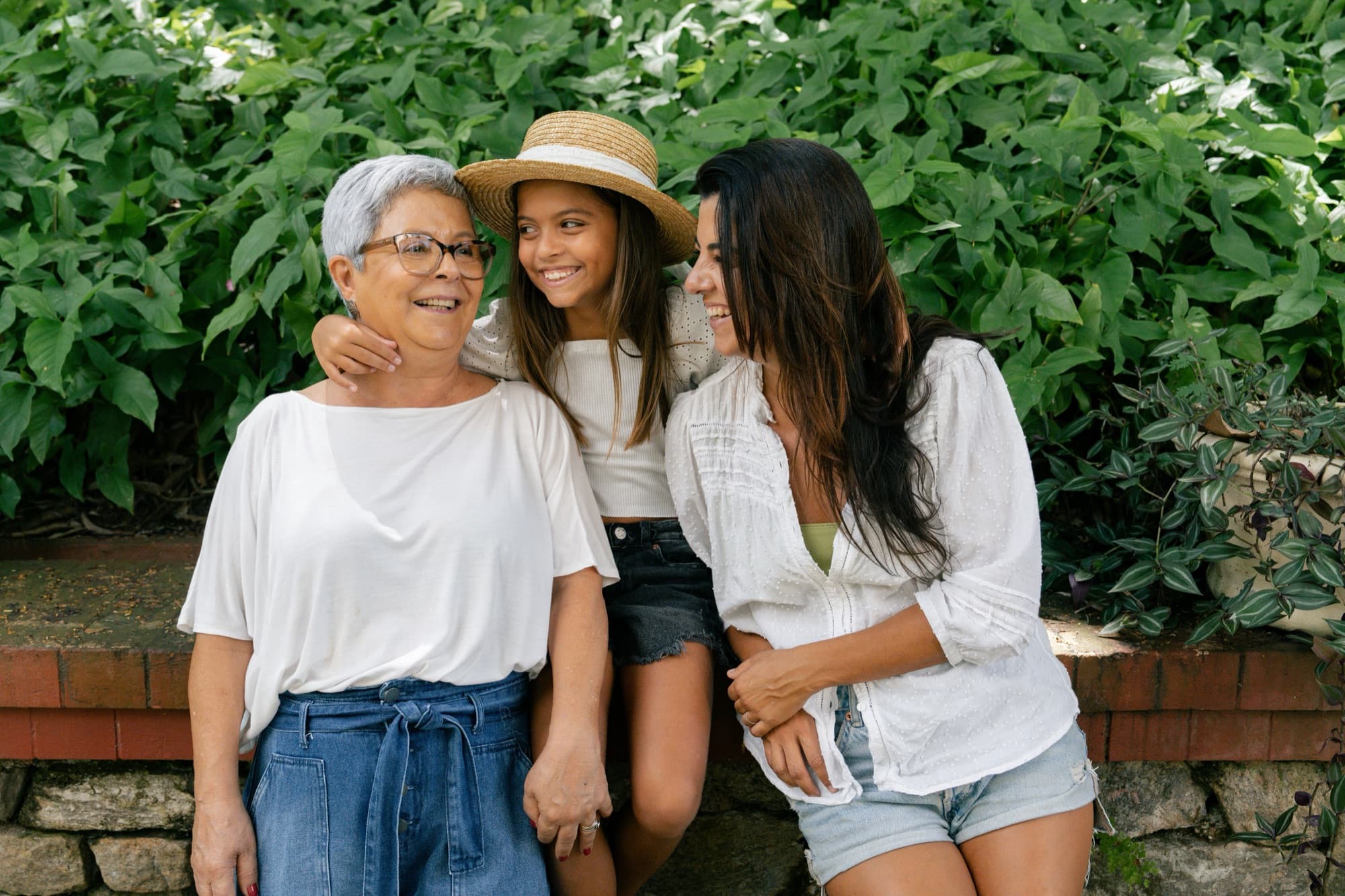 Three generations of a family laughing together